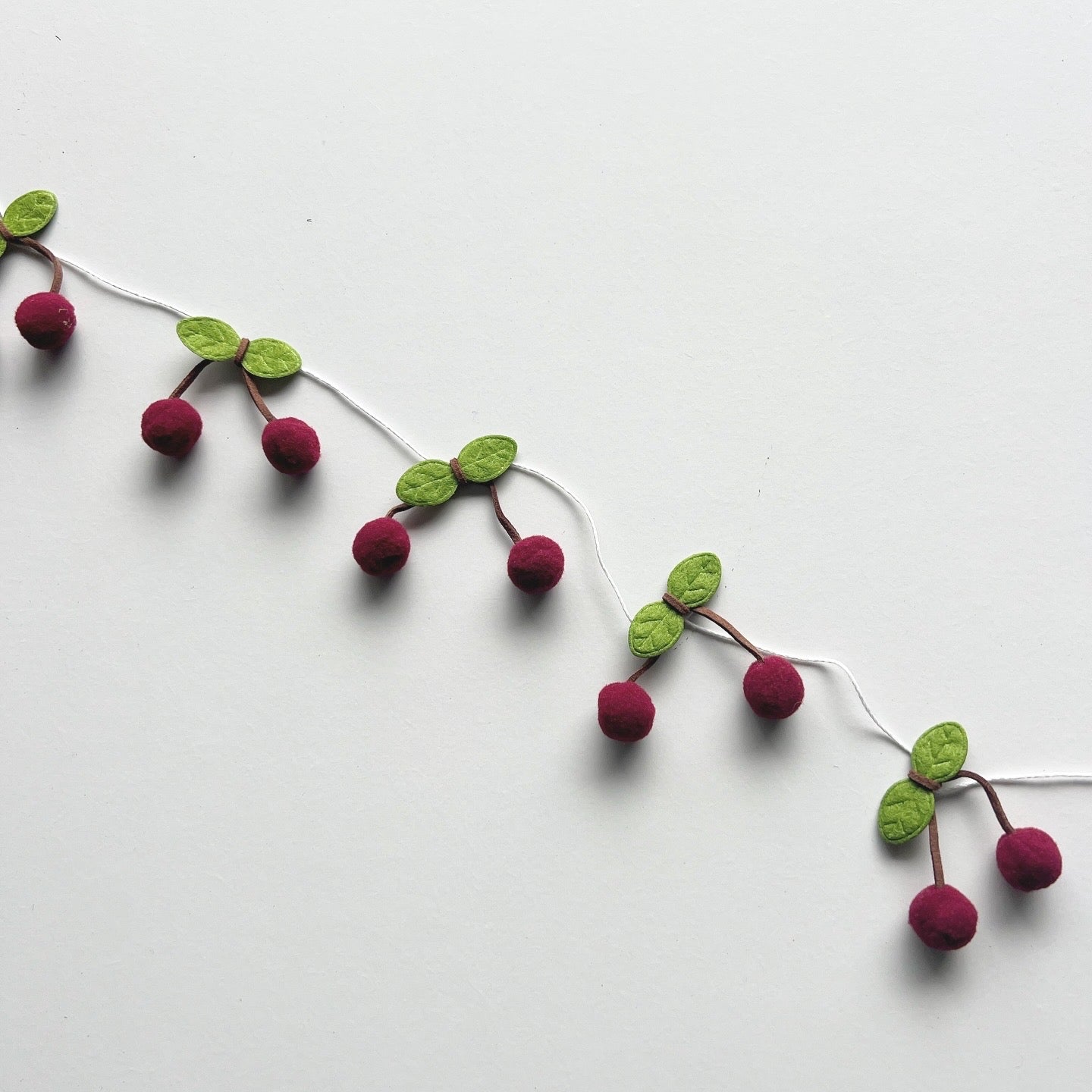 FELT CHERRY GARLAND